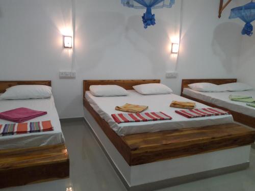 Ein Bett oder Betten in einem Zimmer der Unterkunft Eagle Safari Cottage