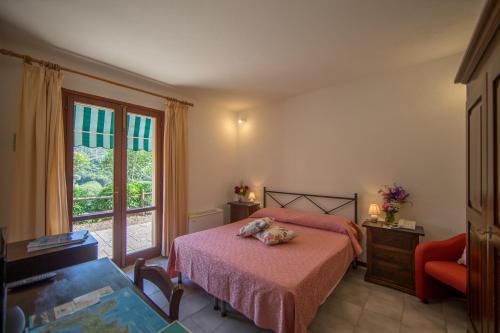 Postel nebo postele na pokoji v ubytování Hotel La Feluca