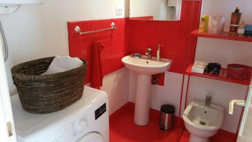 a small bathroom with a sink and a toilet at Holiday Home Bobovisca in Ložišće
