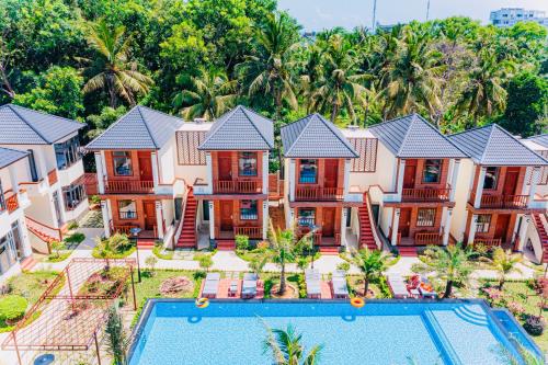 an aerial view of a villa with a swimming pool at Palm Bay Resort Phu Quoc in Phu Quoc