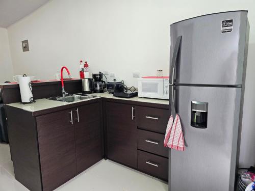 Kuchyň nebo kuchyňský kout v ubytování EcoStudio