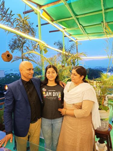 a group of three people standing next to each other at CHOUDHARY WHITE HOUSE Udaipur in Udaipur
