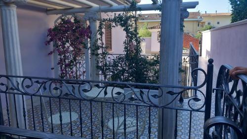 a wrought iron fence in front of a house at B&B Domus Aurea 20 in San Giovanni Teatino