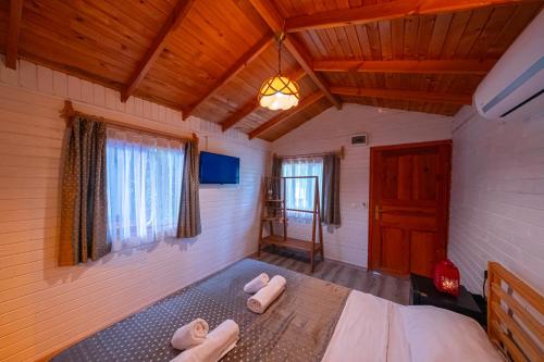 Кровать или кровати в номере Koala Bungalows