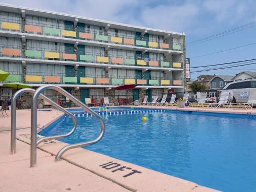 a large swimming pool in front of a hotel at Skyview Manor Motel in Seaside Heights