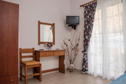Телевизор и/или развлекательный центр в Anna Maria Apartments