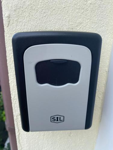 a switch on the side of a wall at 51 Innes Street Apartment in Inverness