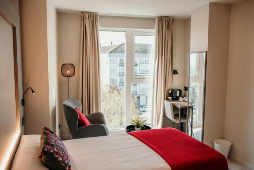 Ένα ή περισσότερα κρεβάτια σε δωμάτιο στο Hotel Lux Melide