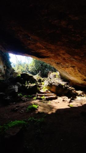 a view from inside of a cave with rocks at Artist's Home in Jerzu