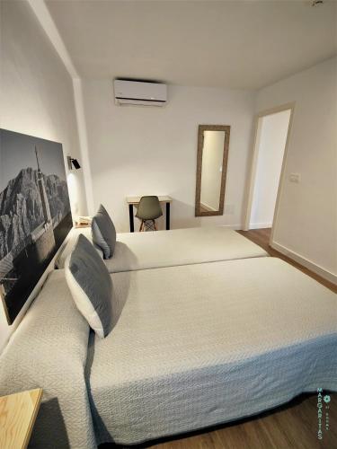 Postel nebo postele na pokoji v ubytování Margaritas 21 Rooms