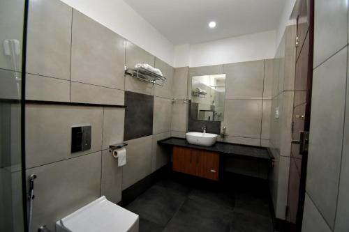 Koupelna v ubytování ARAKKAL GUESTHOUSE