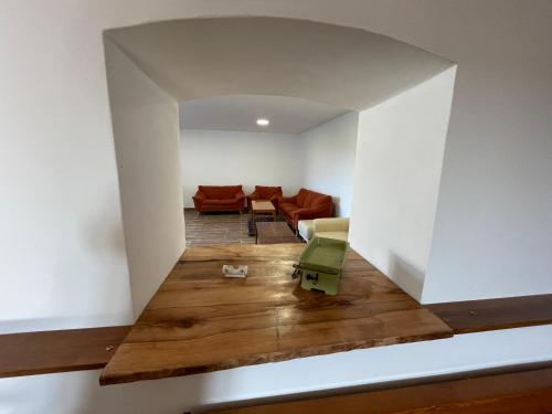 a living room with a couch and a table at Chalupa Sviny in Sviny