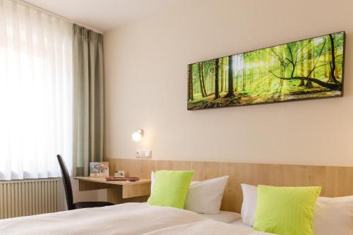 TV a/nebo společenská místnost v ubytování AKZENT Hotel Meerfräulein