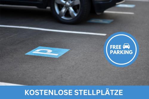 a parking sign in a parking lot with a car at The Shine - Premium Studio-HBF-Messe-Bürgerweide-CityGate-ÖVB Arena in Bremen