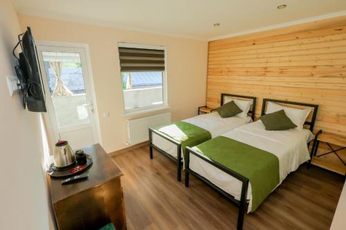 Postel nebo postele na pokoji v ubytování Native Hatis Mount Eco Resort