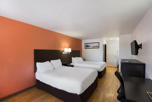 Postel nebo postele na pokoji v ubytování Quality Inn & Suites Junction