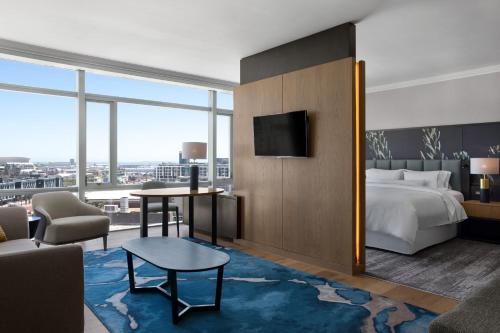 a hotel room with a bed and a tv at The Westin Cape Town in Cape Town
