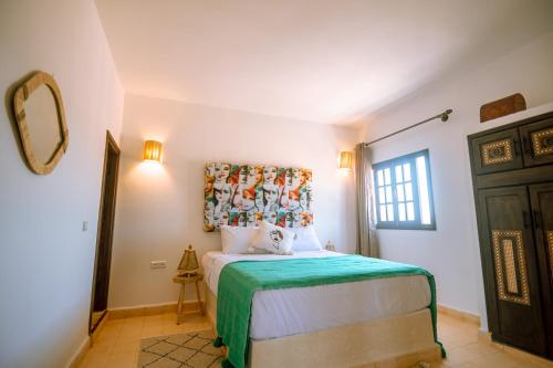 Letto o letti in una camera di villa Floratus