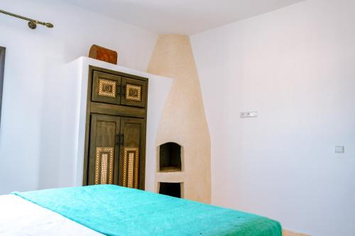 Letto o letti in una camera di villa Floratus