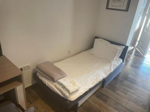 Postel nebo postele na pokoji v ubytování Apartmani BOBO