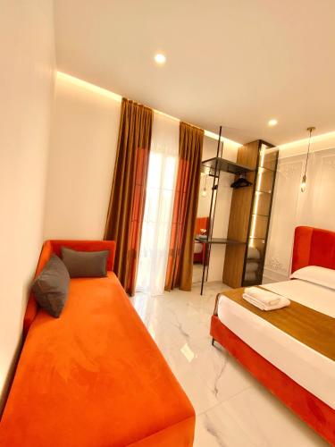 a hotel room with two beds and a bathroom at Apartments Oda Hotel in Velipojë