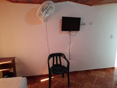 TV a/nebo společenská místnost v ubytování HOTEL NUEVO SOL