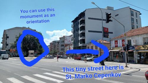 a picture of a city street with a traffic light at Milan's Apartment in Skopje