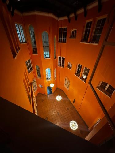 an overhead view of a building with orange walls at Hotel Artistico in Bogotá