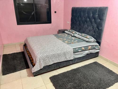 Кровать или кровати в номере Residence Mly youssef appart
