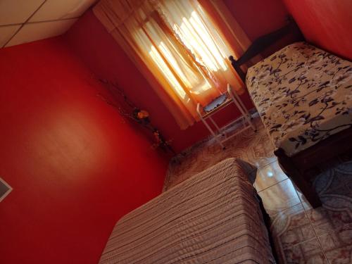 Een bed of bedden in een kamer bij Casa Merceditas
