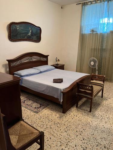 A bed or beds in a room at Villa Quinto