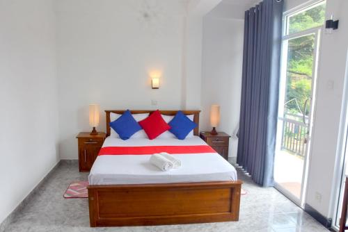 Postel nebo postele na pokoji v ubytování Cozy Homestay Kandy