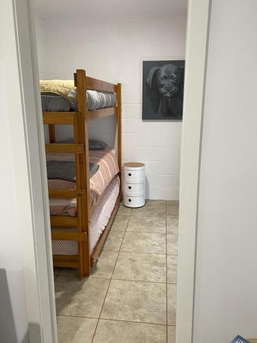 a hallway with bunk beds in a room at Marlo Hideaway in Marlo