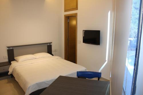 Katil atau katil-katil dalam bilik di Le Caravelle Beirut