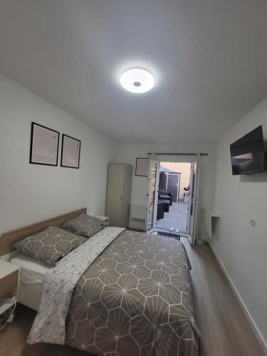 Letto o letti in una camera di Studio proche gare Vernon Giverny terrasse Parking