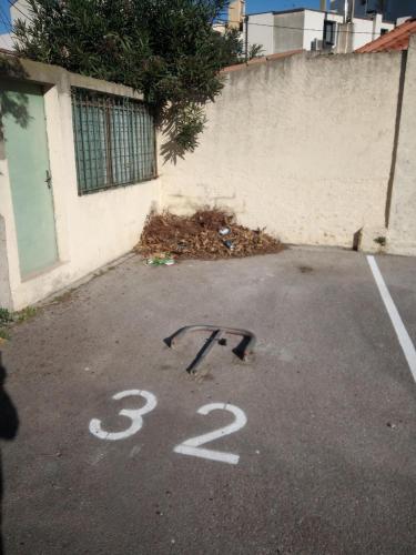 a parking lot with the number painted on it at T3 Vue Mer Clim Wifi Parking in Canet-en-Roussillon