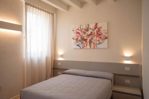 Postel nebo postele na pokoji v ubytování Maison Calcirelli rooms