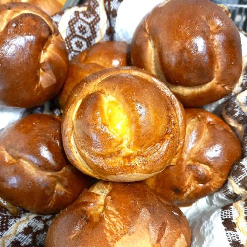 a pile of buns sitting on a table at Blumenhof Bucovina in Voronet