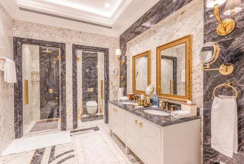 a bathroom with a sink and a shower at Wellness Park Hotel Bactria in Samarkand
