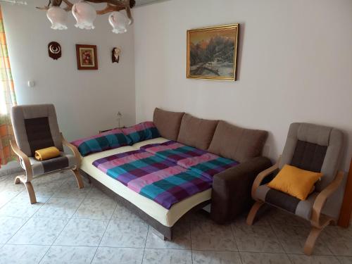 Postel nebo postele na pokoji v ubytování Fődi apartman