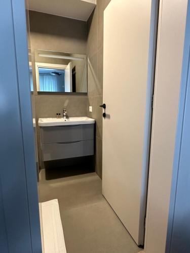 Koupelna v ubytování Soin Rooms