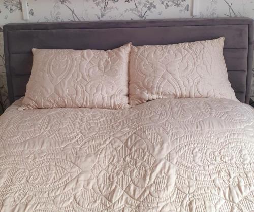 Ένα ή περισσότερα κρεβάτια σε δωμάτιο στο Apartament Comfort I Kołobrzeg