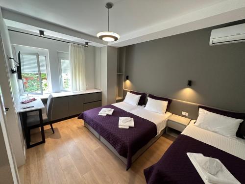 Postel nebo postele na pokoji v ubytování Soin Rooms