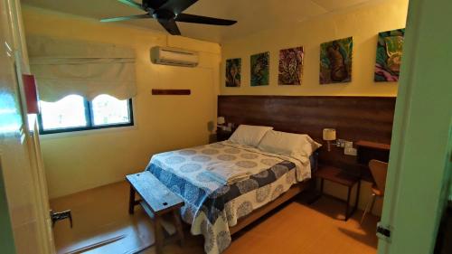 Кровать или кровати в номере Kampung B&B Homestay