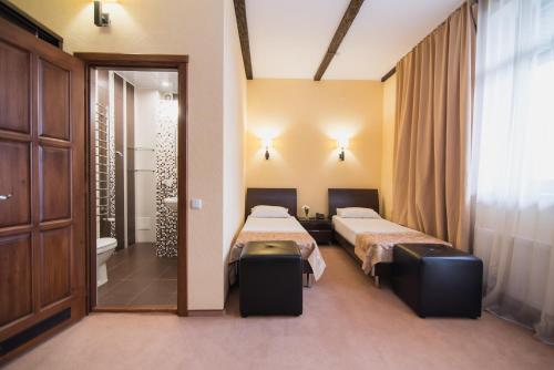 Postel nebo postele na pokoji v ubytování Ruta Resort Polyana