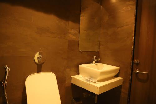 Un baño de Hotel Sai Pritam
