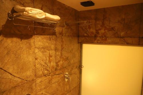 Un baño de Hotel Sai Pritam