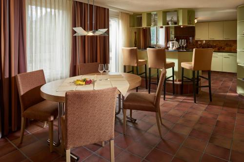 Kuchyň nebo kuchyňský kout v ubytování Hotel Alexander