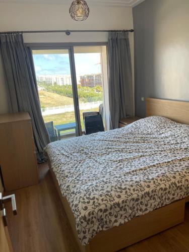 Una cama o camas en una habitación de Superbe Appt avec grande piscine 2