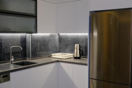 Η κουζίνα ή μικρή κουζίνα στο Mercan Suites Ilıca